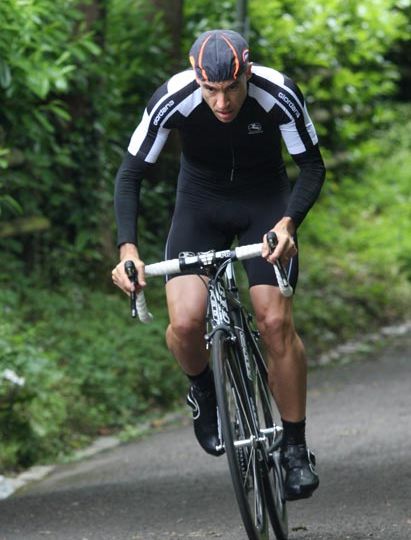 A competitor rides the waller pain hill climb comptetiton.